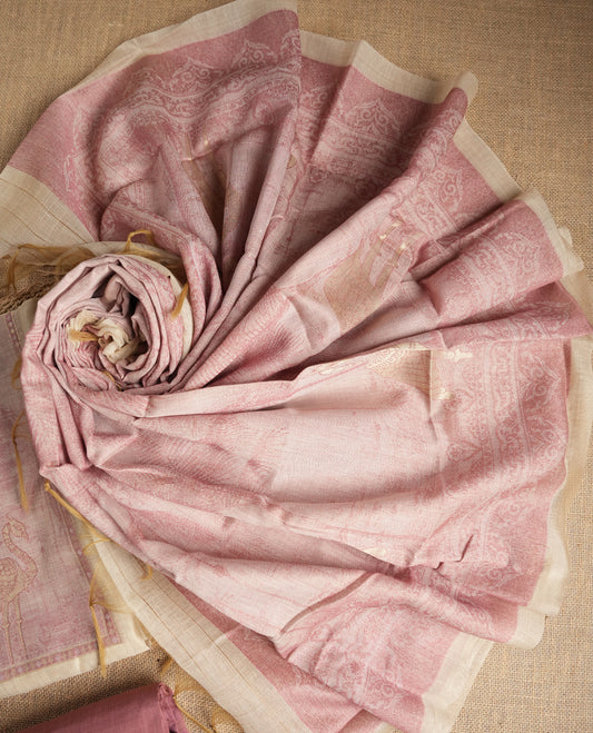 Beige & Onion pink colour suit material adorned with intricate woven patterns, bird print & subtle motifs, exuding ethnic grace & paired with a beautifully bordered dupatta and a matching plain bottom.