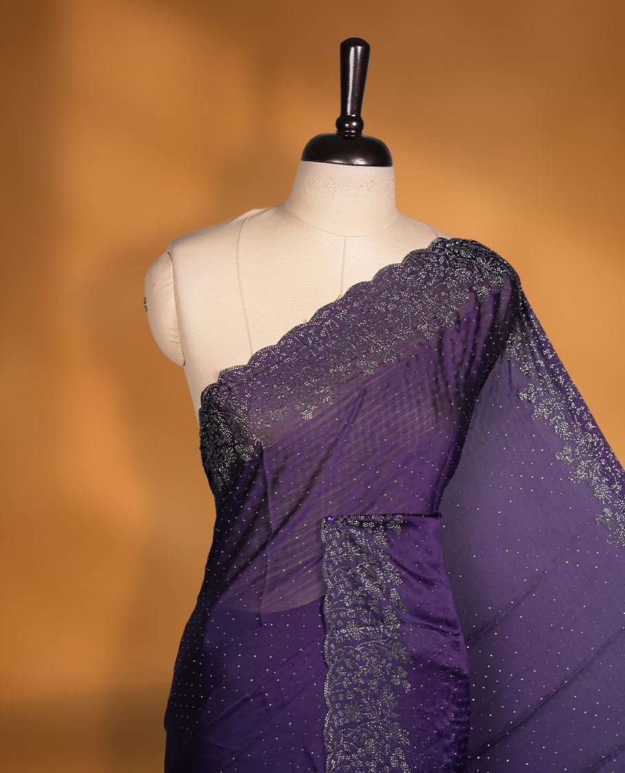 Dark Purple Colour Chiffon Designer Saree featuring Delicate White Stone Work All Over the Body, with Stone Detailing on the Border and Pallu, paired with a Matching Blouse.