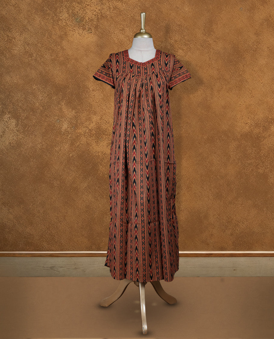 Dull orange colour Nstyle nighty with featuring a black and red Geometric pattern, a Diamond neckline, Short sleeve, and a full-length