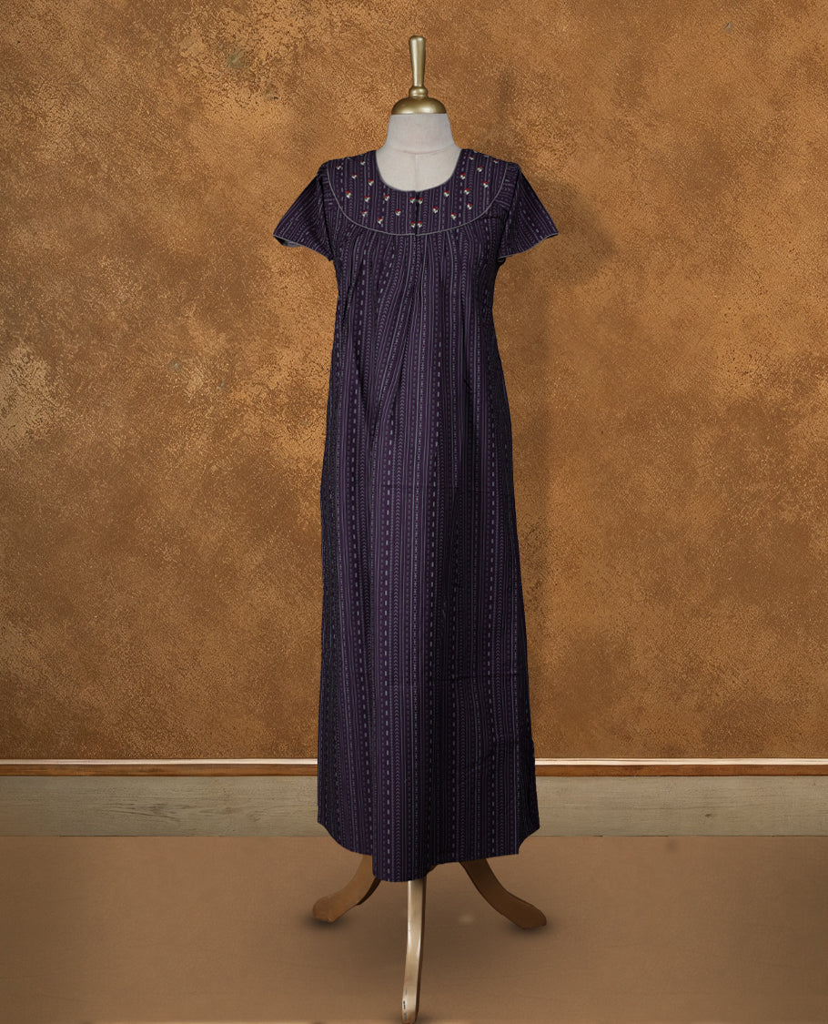 Purple colour NStyle nighty featuring striped patterns, a round neckline with floral embroidery detailing, short sleeves, and a full ankle-length design