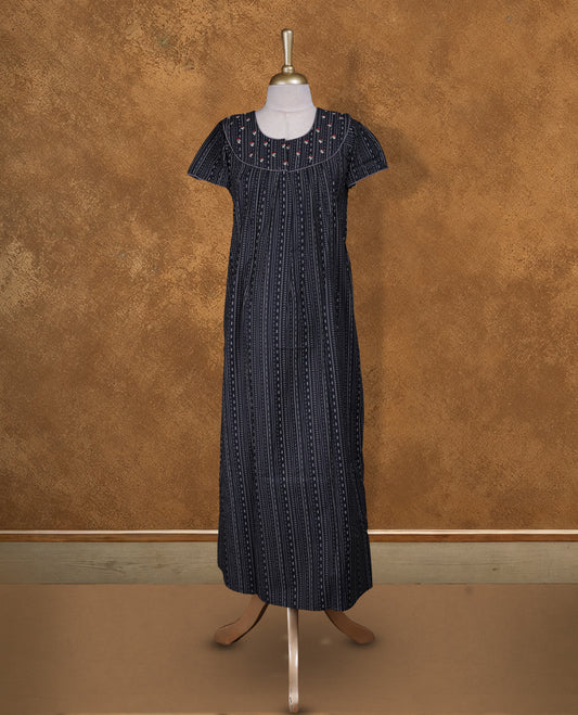 Black colour NStyle nighty featuring gray geometric pattern, coloured floral patterns on a U neckline with gray colour pipe details , short sleeves, and a full ankle-length design.