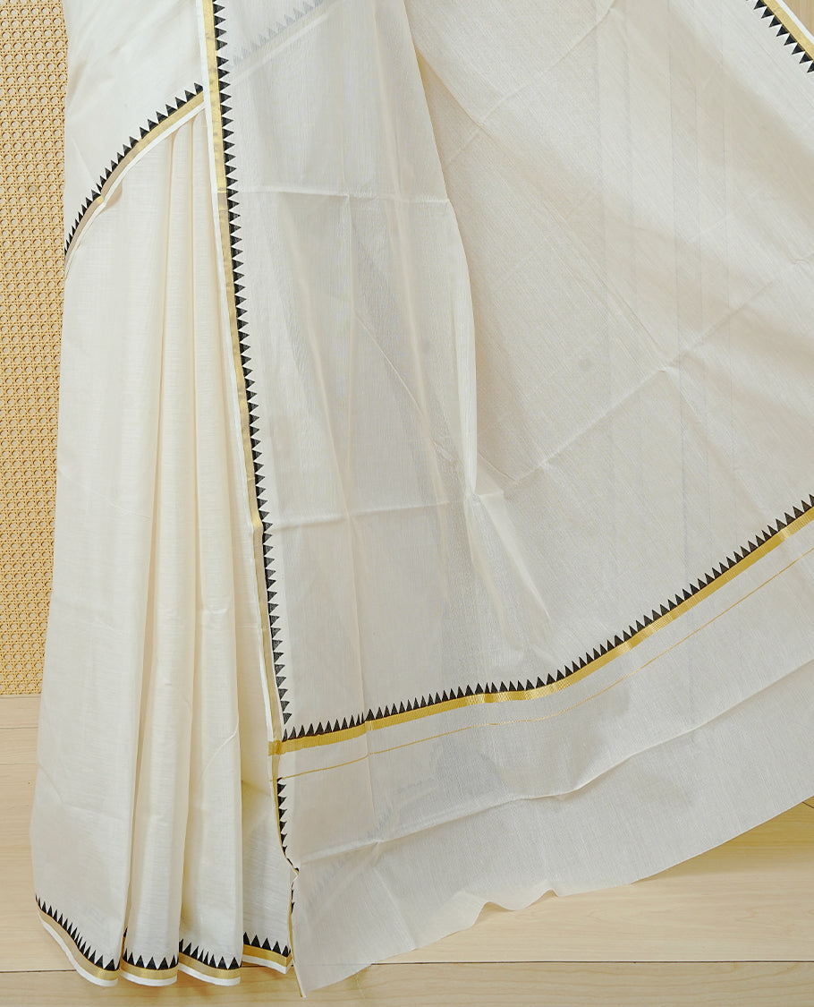 Cream Colour Cotton Kerala Saree Featuring A Gold Zari Border And Black Temple Edging, Paired With A Matching Blouse Piece