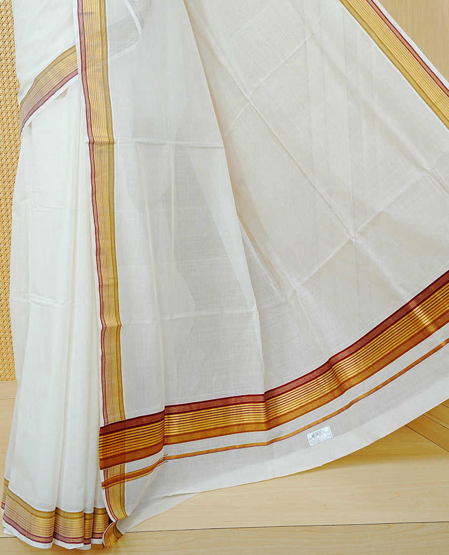 Cream Colour Cotton Kerala Saree Featuring a Plain Body, Enhanced with a Gold Zari and Maroon Border, Traditional Gold Zari Pallu, and a Matching Blouse Piece.