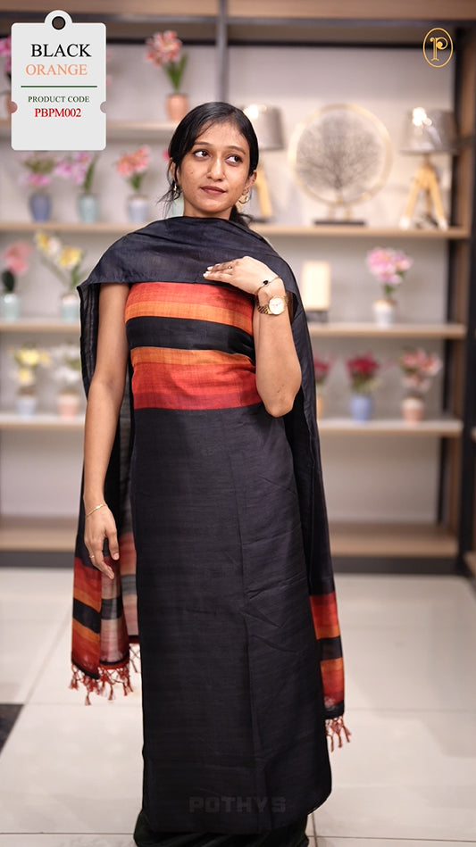 Black colour semi tussar silk salwar material featuring elegant horizontal stripes on the yoke and dupatta, woven in shades of orange and yellow & Paired with a matching plain bottom.