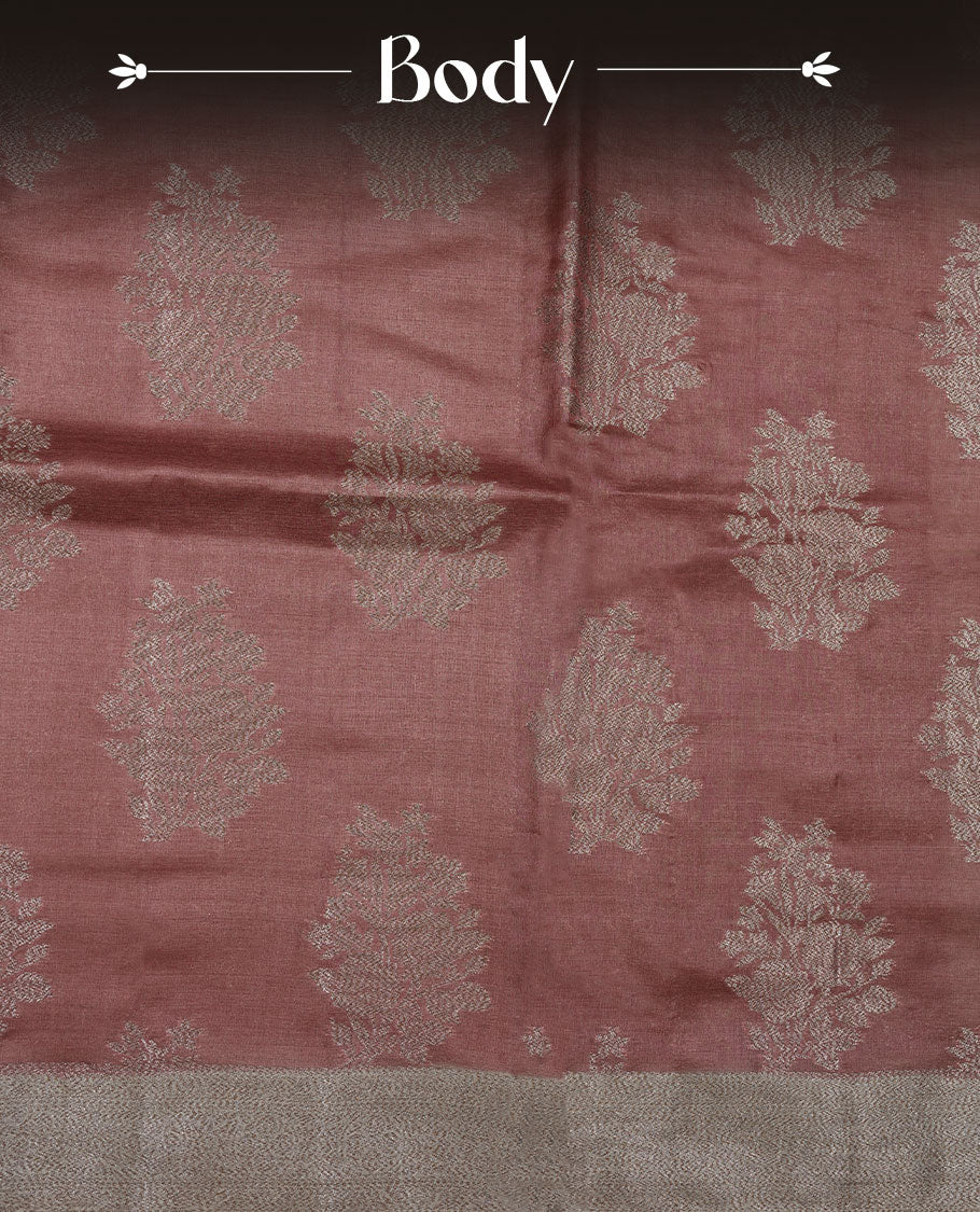 Light brown colour pure banaras tusser silk saree highlighting antique zari pattern across body, with contrast cream colour with zari border and paired with matching blouse