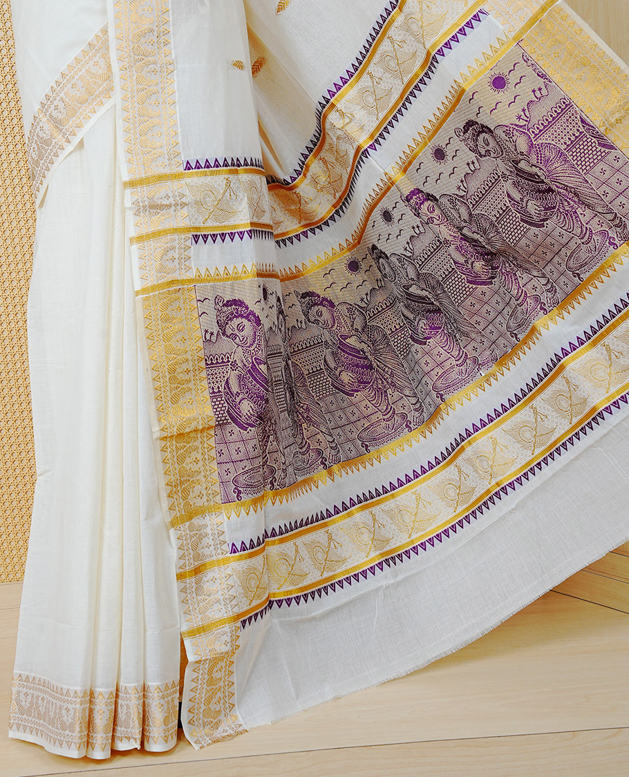 Cream Colour Cotton Kerala Saree Featuring Gold Buttas on the Body, a Classy Gold Zari Border, and a Traditional Violet Colour Lord Krishna Thread work and Gold Zari Pallu, Paired with a Matching Blouse Piece.