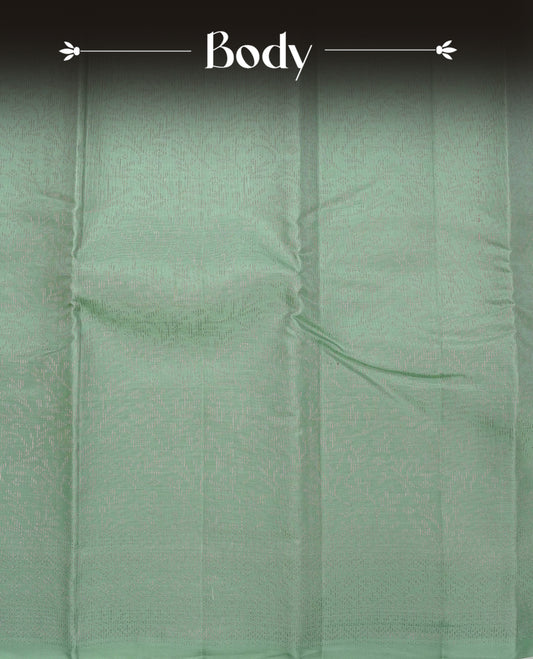 Mint Green Colour soft silk saree featuring elegant Zari Work across the body, complemented by a matching self design pallu, paired with a matching blouse piece.