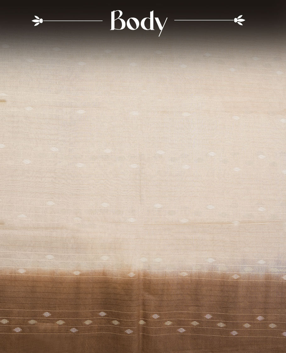 Cream & light brown dye pattern colour semi jute saree highlighting white stripped body, without border and paired with matching blouse.