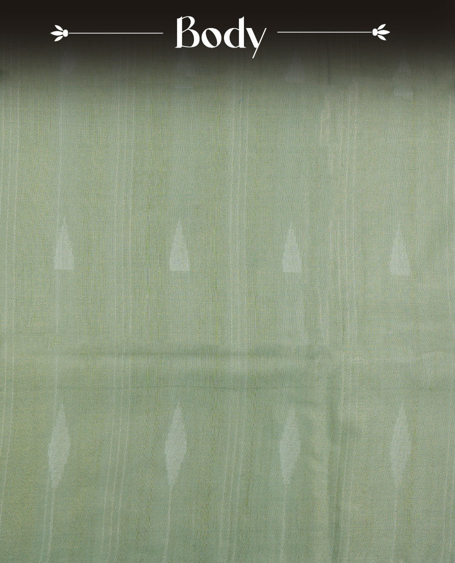 Light green colour semi jute saree highlighting gold zari stripped body with white motifs, without border and paired with matching blouse.