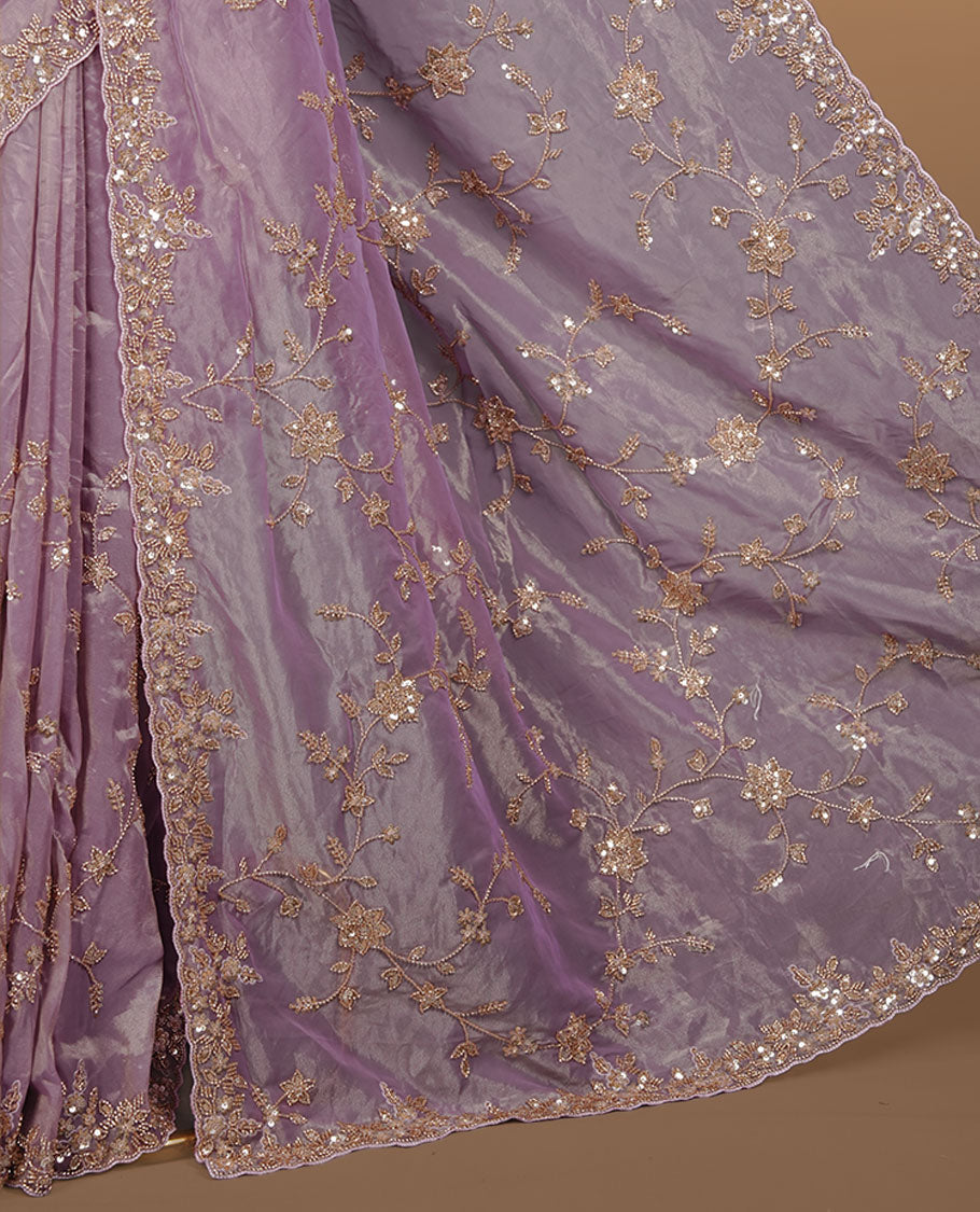 Pastel purple colour net organza saree featuring cut beats and sequins floral kodi pattern on body, enhanced with worked border and cut beats work on blouse piece.