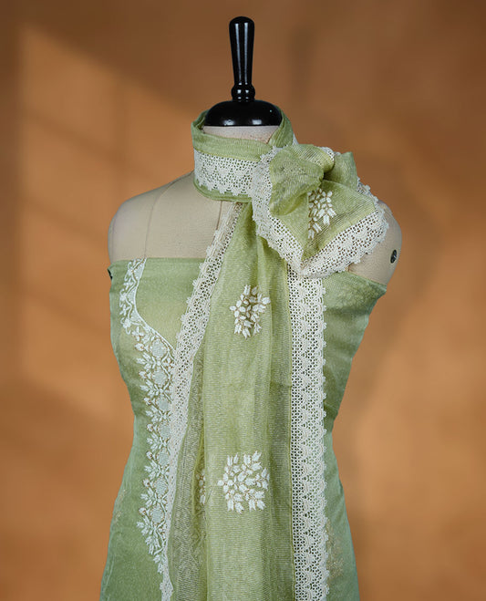 Pista green colour churidar set with off white thread embroidery and pearl detailing, paired with cotton matching pant and dupatta.