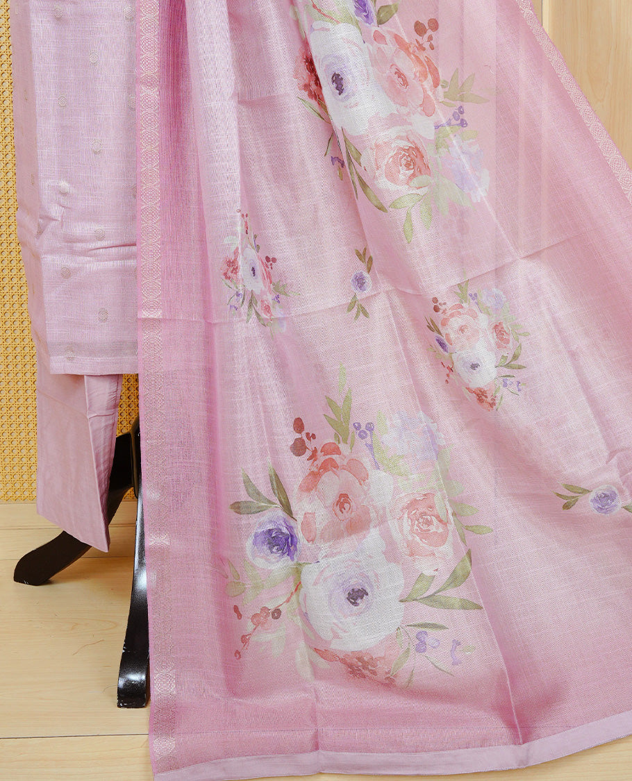 Dusty rose colour churidar set with delicate thread embroidery on the round neckline, featuring subtle woven buti detailing, paired with a matching floral printed woven dupatta and solid pants.