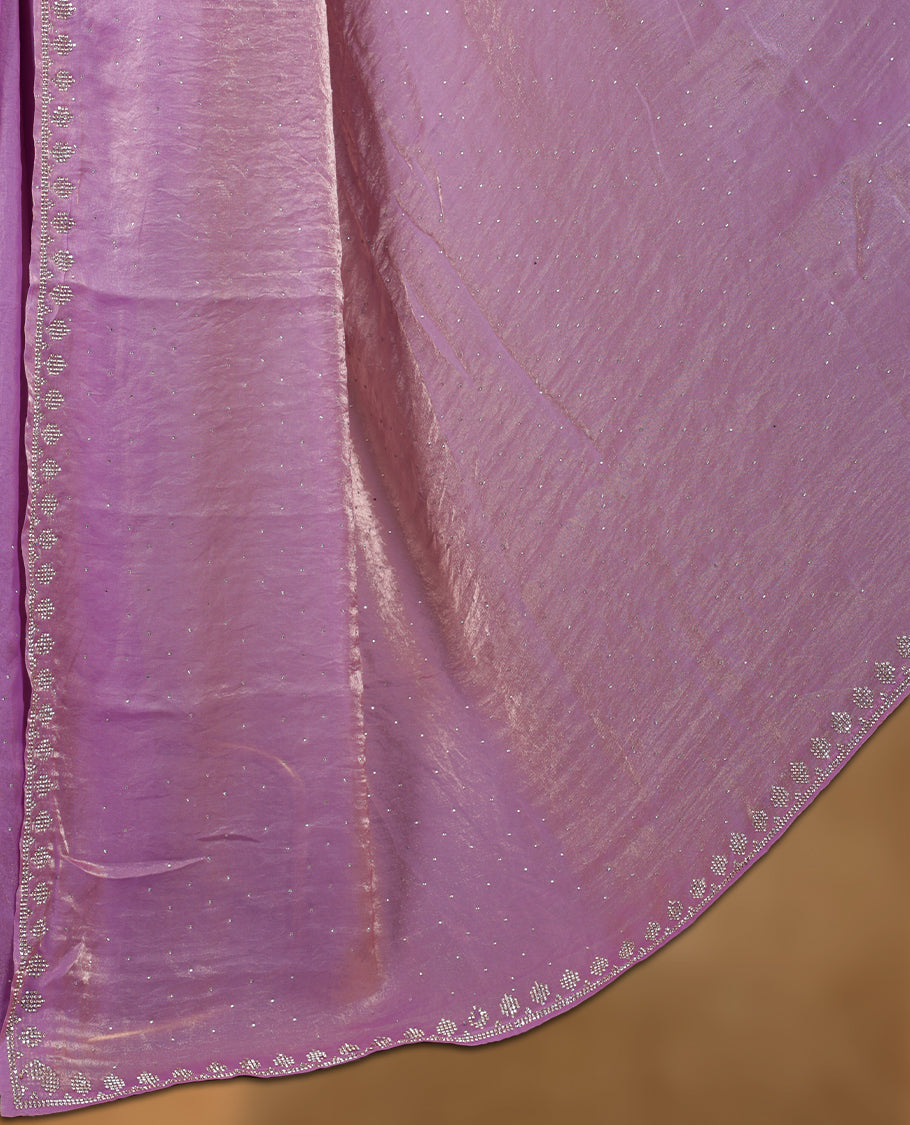 Lavender & pink double shade Colour net shimmer fancy saree adorned with scattered gold stone buttas all over the body, paired with a delicate stone worked border and matching blouse