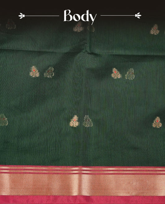 Dark green colour Maheshwari cotton saree, gold zari floral motifs on body, complement pink colour gold zari border comes with matching blouse.