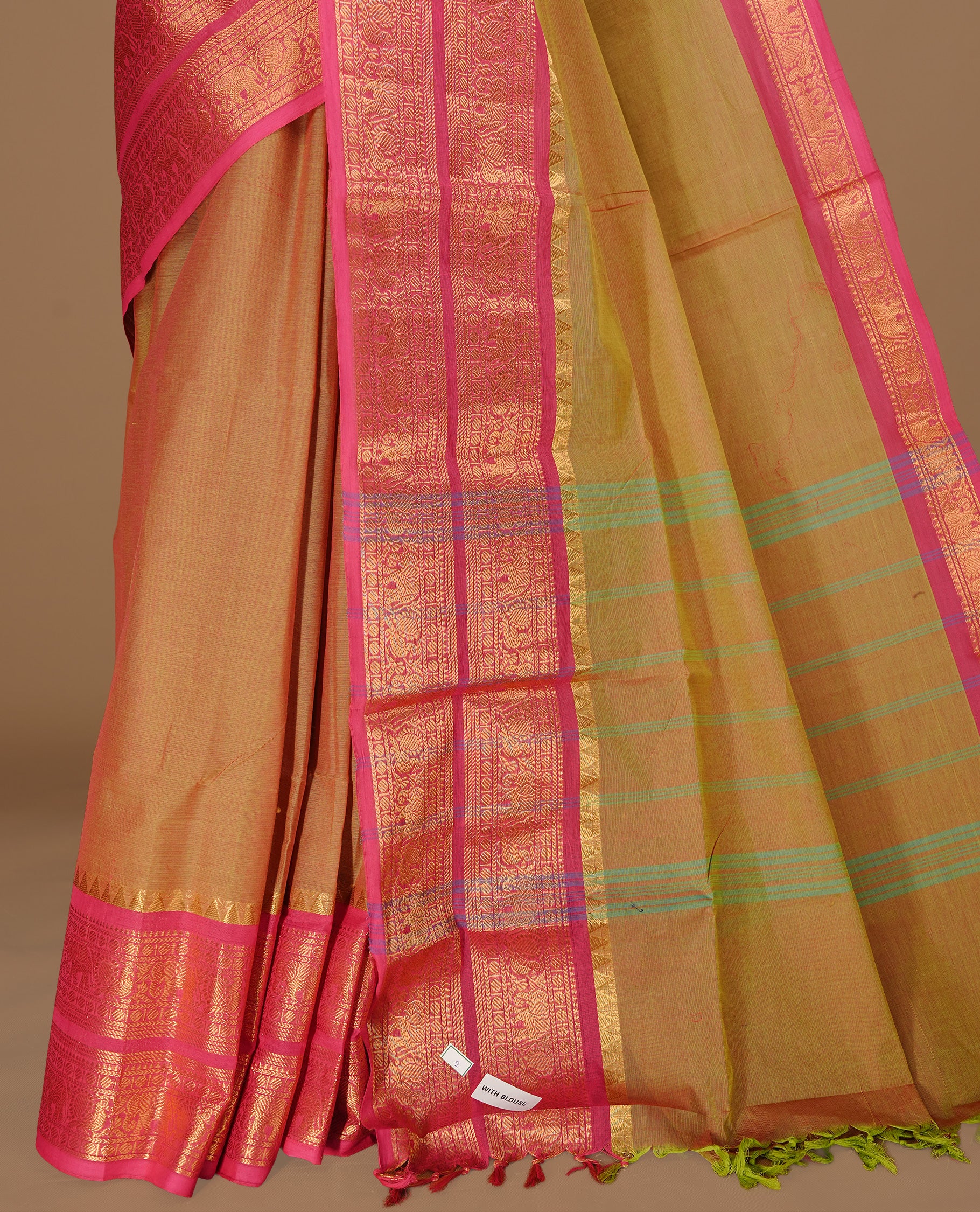 Olive colour Chettinad cotton saree featuring Elegant plain body, complemented by contrast Maroon colour with gold zari border, paired with matching blouse piece.