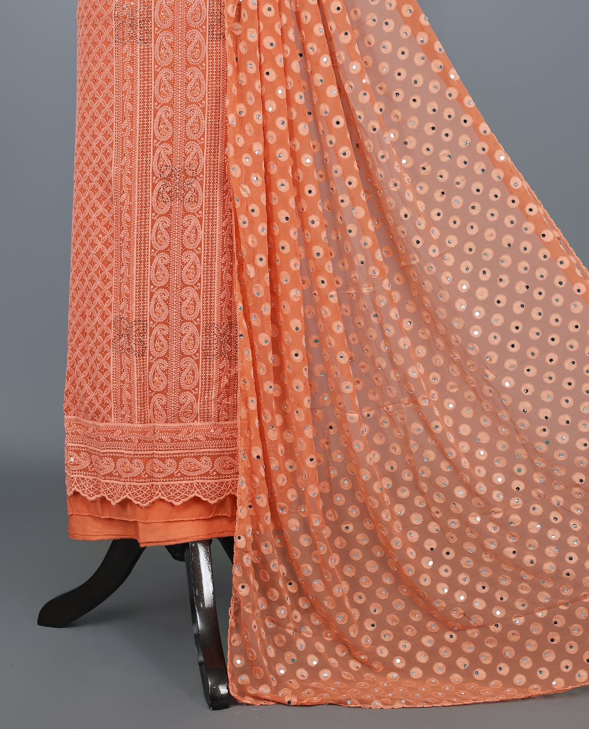 Coral Colour  Georgette Salwar Material featuring elegant Chikankari Work on the kurta, paired with a matching bottom and a stunning sequin-embellished dupatta for a graceful festive look.