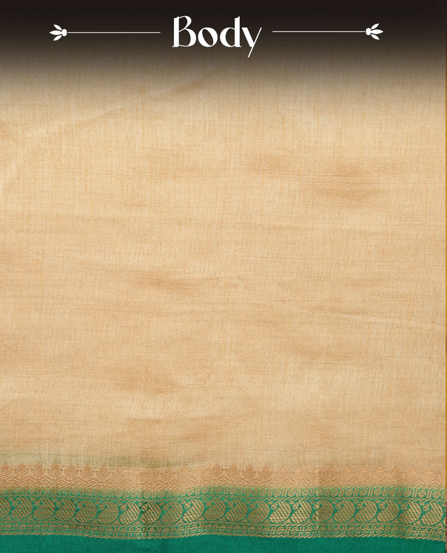 Cream colour semi tussar saree featuring elegant plain body, contrast Green colour gold zari border and comes with matching blouse piece.