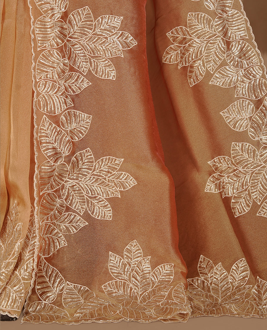 Orange & gold double shade organza saree featuring thread & cut beats, sequins leaf pattern on body, highlighting scalp border, paired with matching blouse piece.