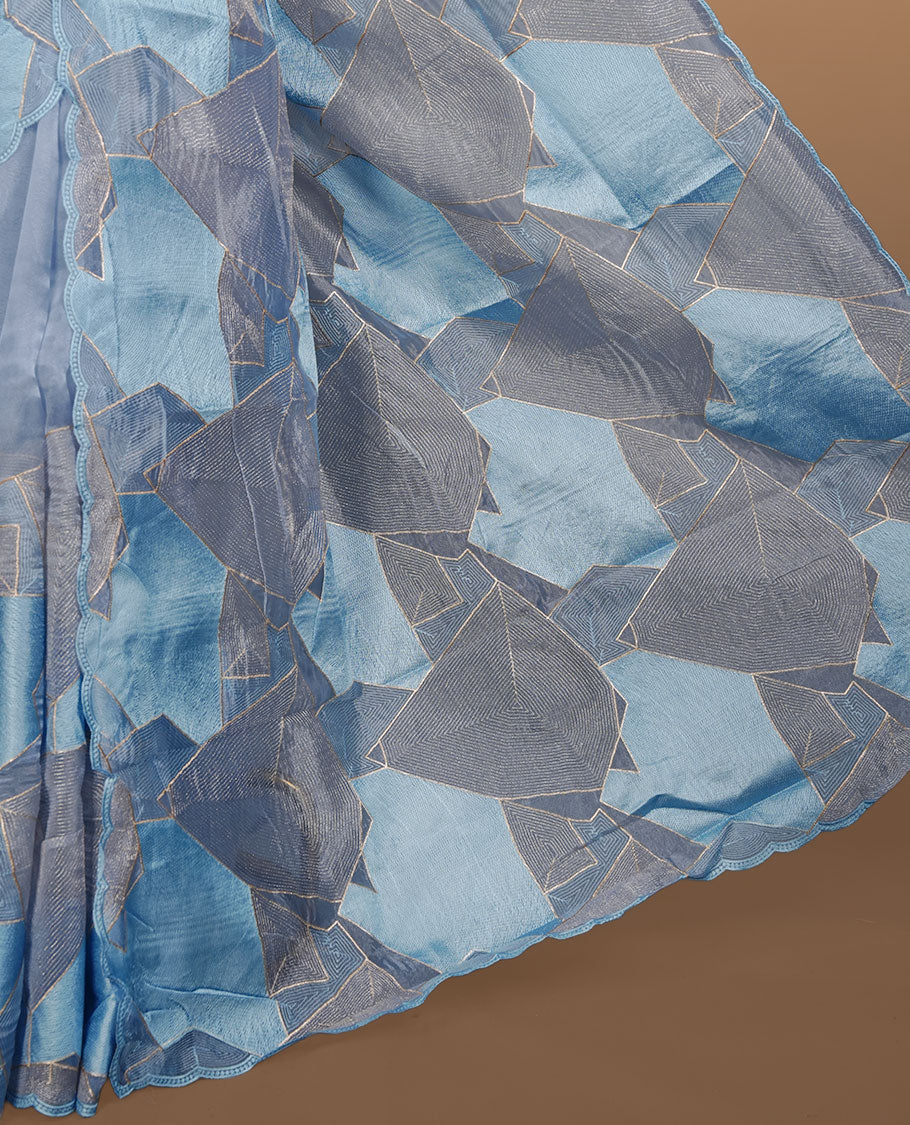 Blue colour Organza designer saree featuring a thread geometric pattern across the body, enhanced with a piping border and cut beats work on matching blouse piece.