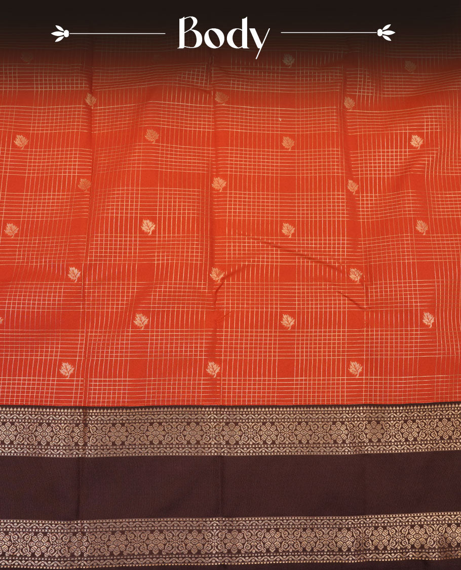 Dark Rust orange colour semi silk saree featuring gold zari checks and small motifs on body highlighting contrast dark chocolate border , paired with matching blouse