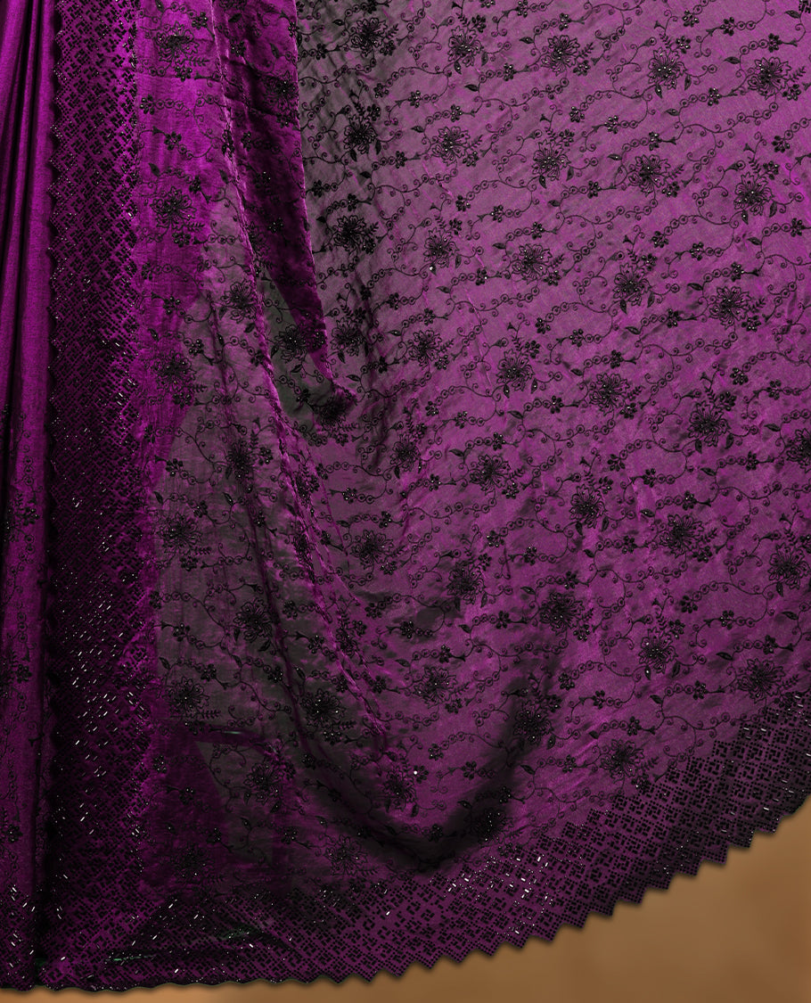 Dark Purple colour velvet chiffon designer saree, featuring black thread embroidery kodi pattern on body, black cut stone work and heavy stone border, pallu and  Paired with matching blouse.