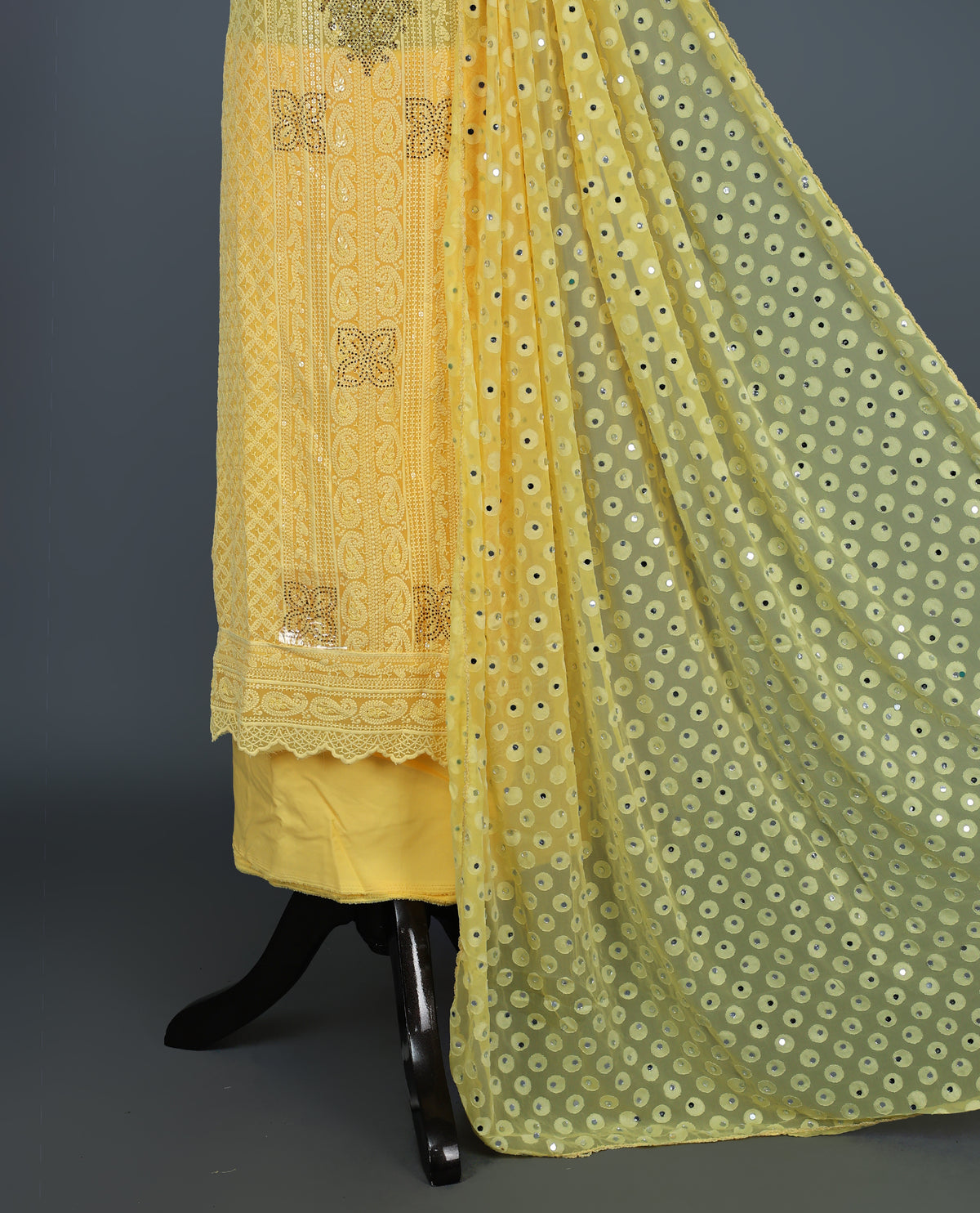 Yellow Colour Georgette Salwar Material featuring elegant Chikankari work on the kurta, paired with a matching bottom and a sequins-embellished dupatta.