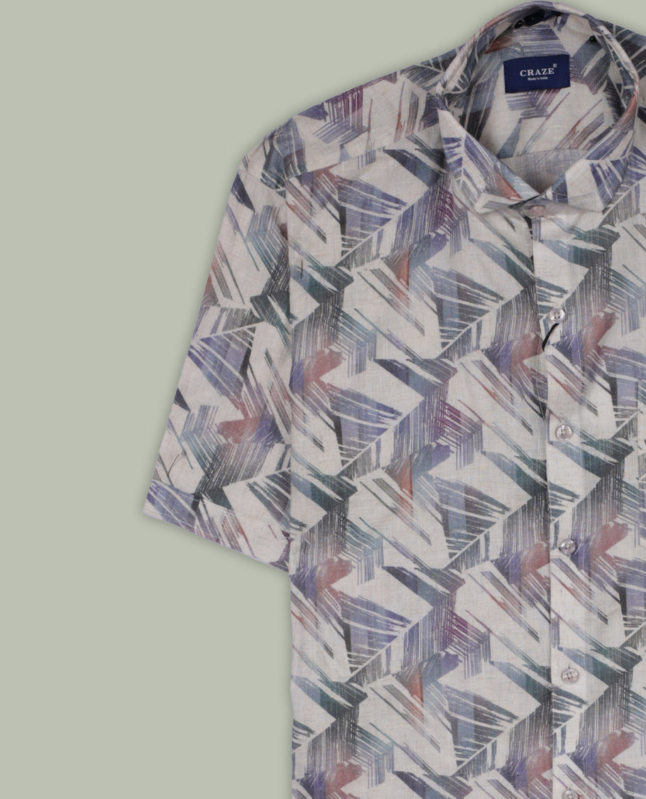 Off white colour shirt with multicolour geometric prints, featuring short sleeves and a classic collar, A stylish and lightweight pick, perfect for casual outings and summer wear.