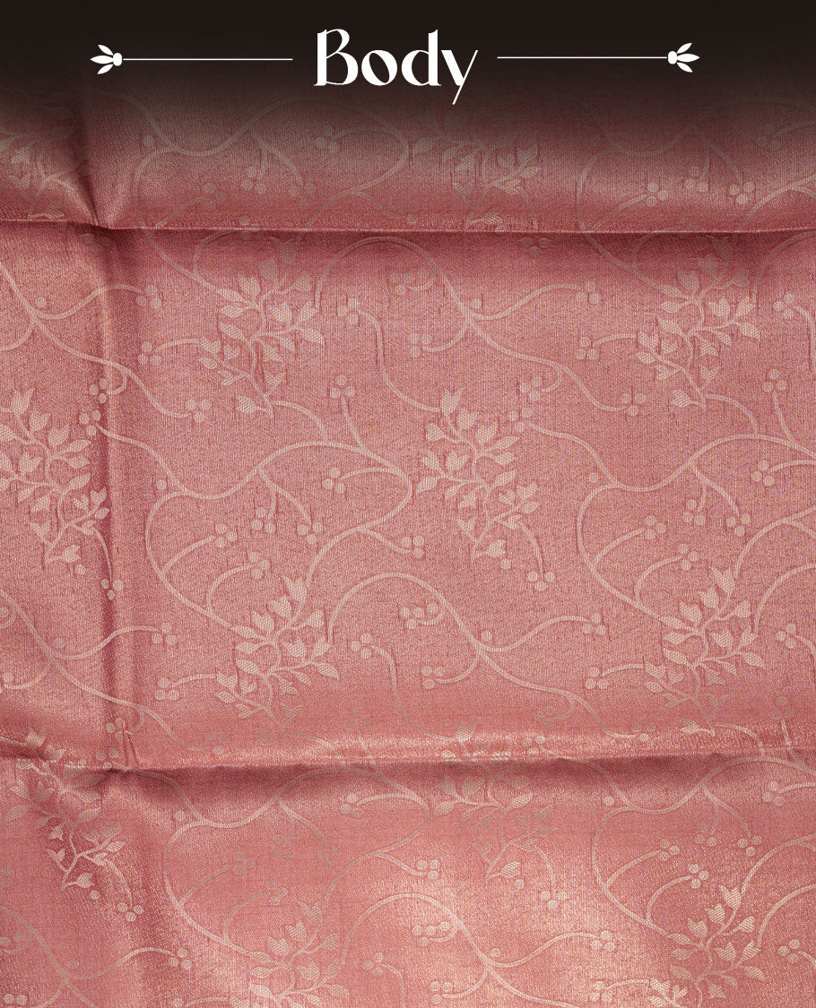 Peach colour semi tussar silk saree, featuring an intricate gold zari floral kodi pattern on the body and pallu, comes with matching blouse.