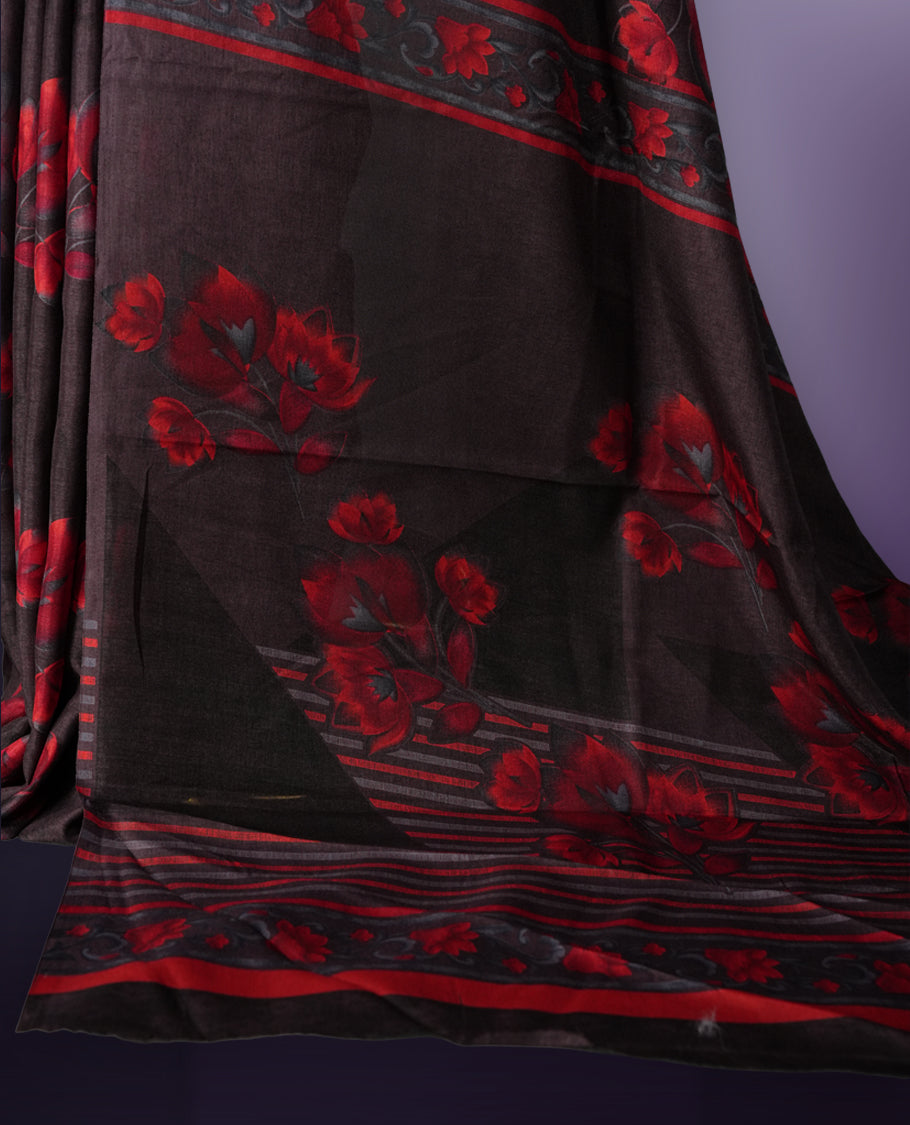 Deep brown colour saree enhanced with a vibrant red colour floral prints on body & pallu, and  comes with a matching blouse.