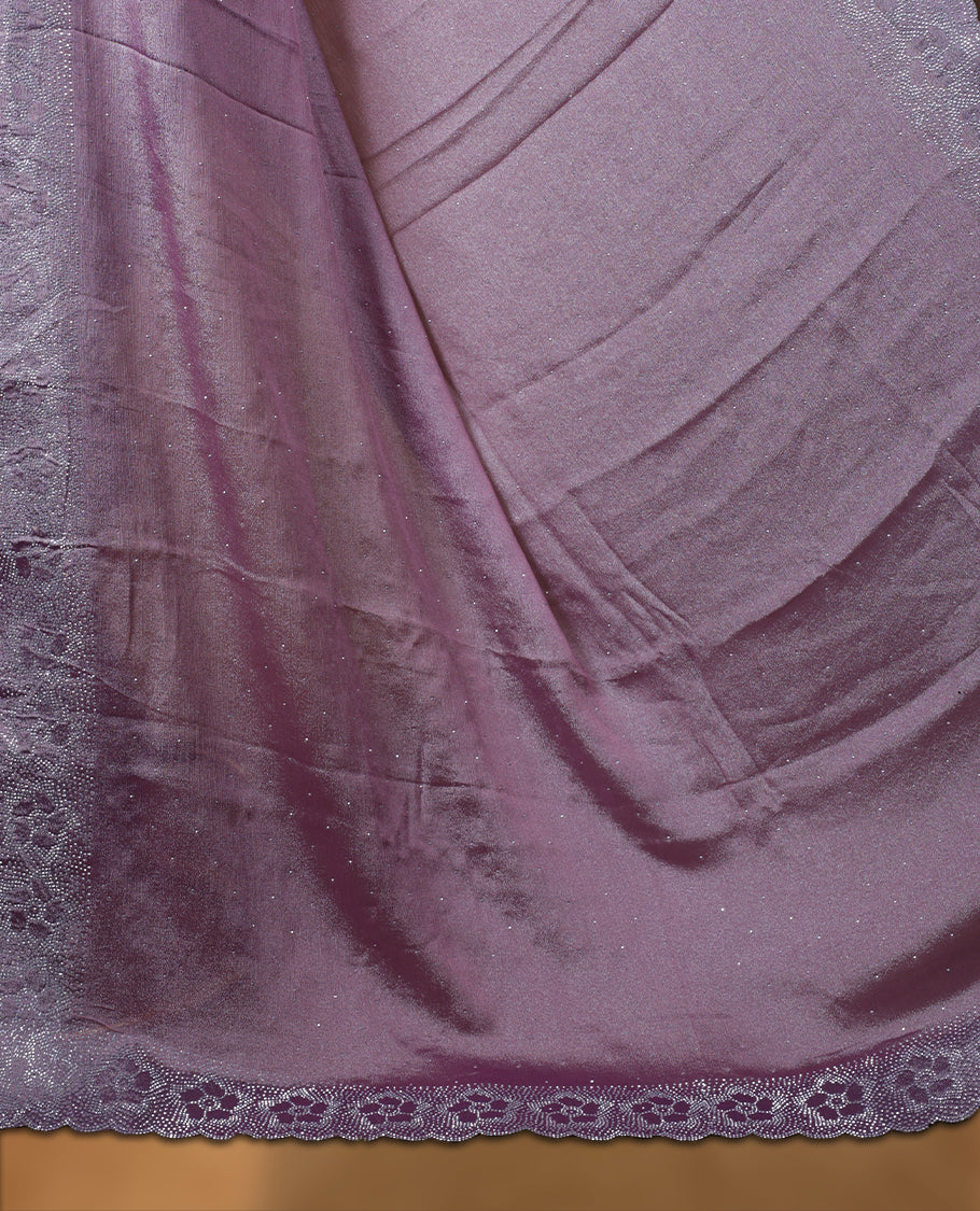 Lavender colour shimmer designer saree, featuring white scattered stone on body, stone work and heavy stone floral pattern on border and  pallu, Paired with matching blouse.