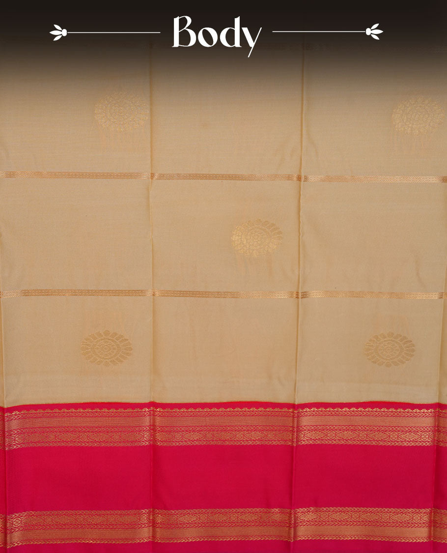 Cream colour semi silk saree highlighting gold zari strip pattern  and motifs across body, featuring contrast pink colour border with gold zari pattern, comes with matching blouse .