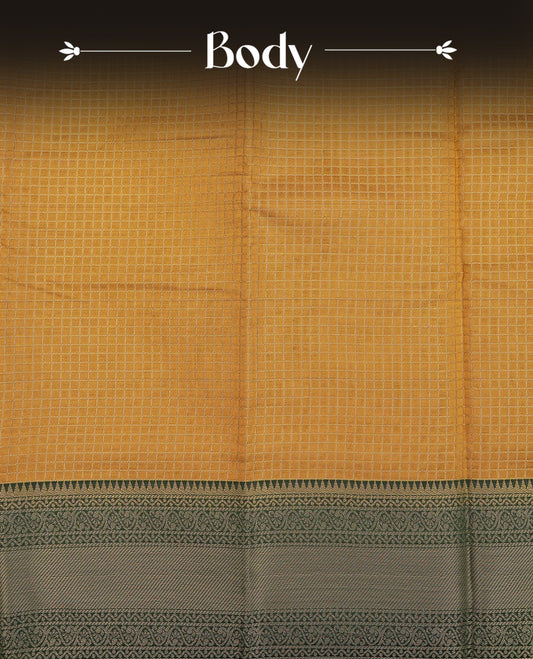 Mustard yellow colour semi silk saree featuring zari check patterns on body, contrast bottle green colour with traditional border on body, grand pallu comes with matching blouse piece