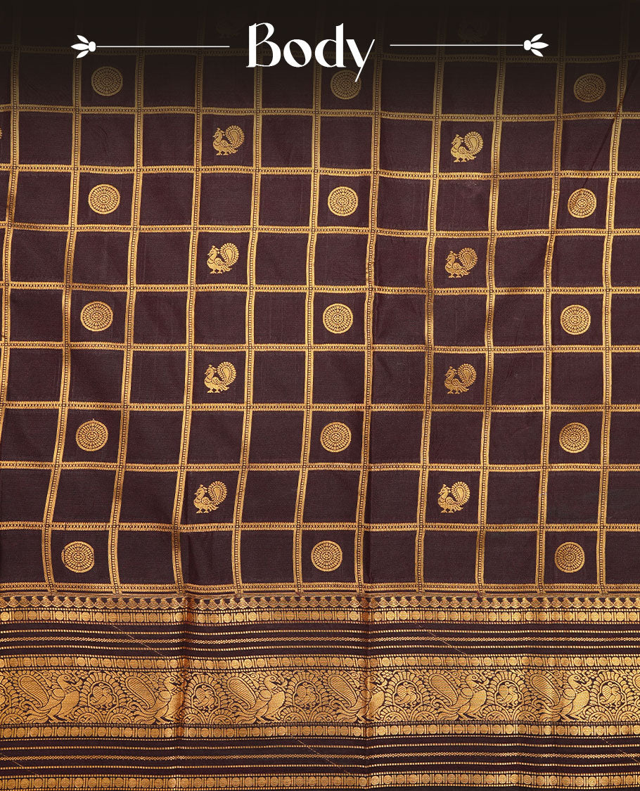 Chocolate colour soft silk saree featuring Gold zari check & motifs on body, complemented by self colour with traditional border, paired with matching blouse piece.