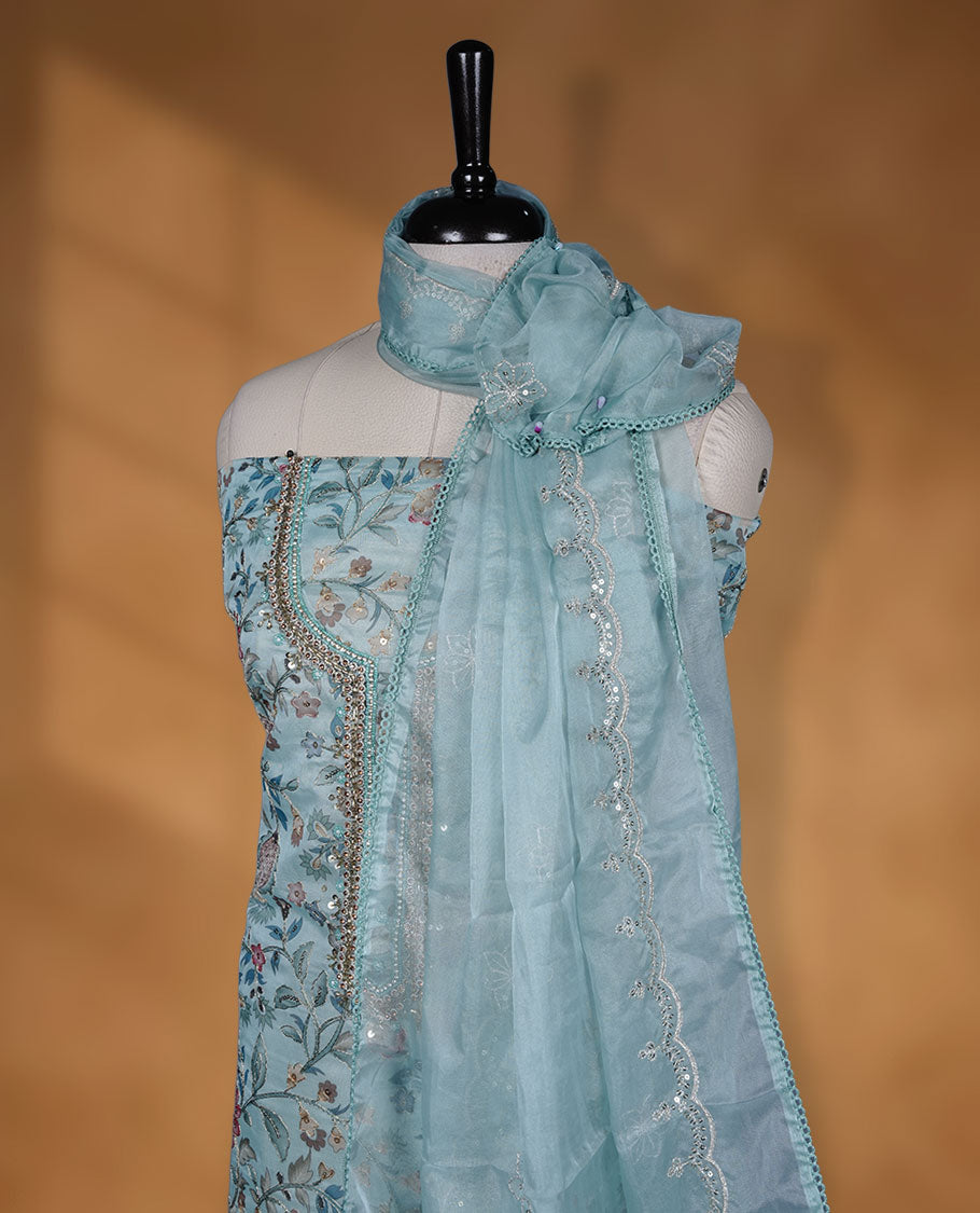 Light Powder blue colour salwar material floral print and thread work on the body, beats and stone on neckline and dupatta with sequence and gold thread work, paired with a plain bottom.