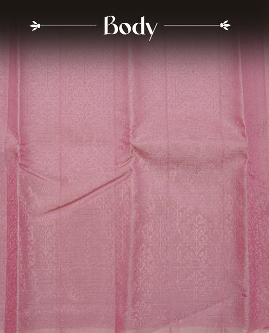 Baby Pink Colour soft silk saree featuring elegant self woven leaf motifs across the body, complemented by a richly woven self design pallu, paired with a matching plain blouse piece.