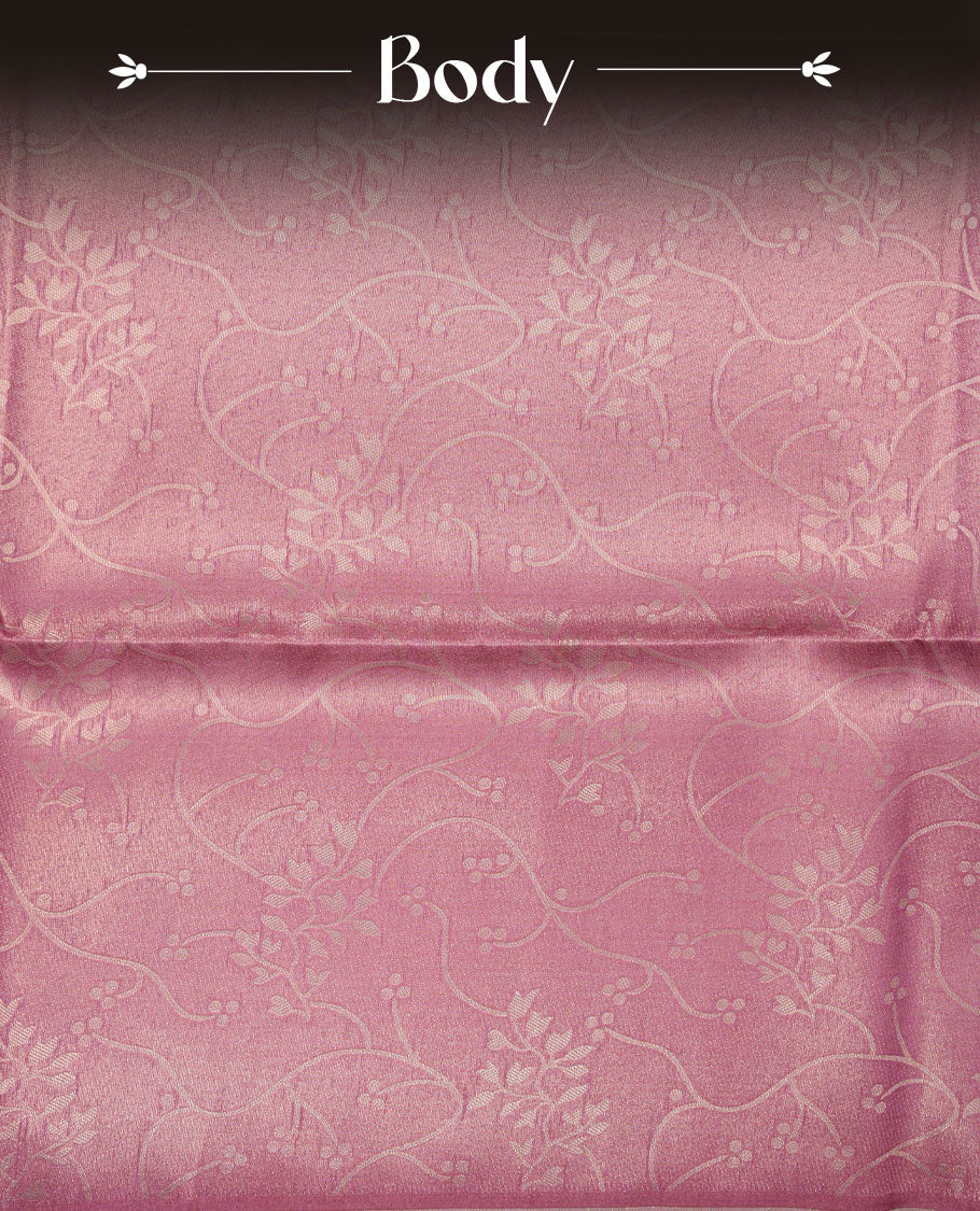 Pink colour semi tussar silk saree, featuring an intricate gold zari floral kodi pattern on the body and pallu, comes with matching blouse.