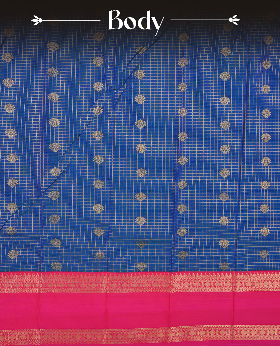 Blue colour semi silk saree highlighting gold zari check pattern  and motifs across body, featuring contrast pink colour border with gold zari pattern, comes with matching blouse .