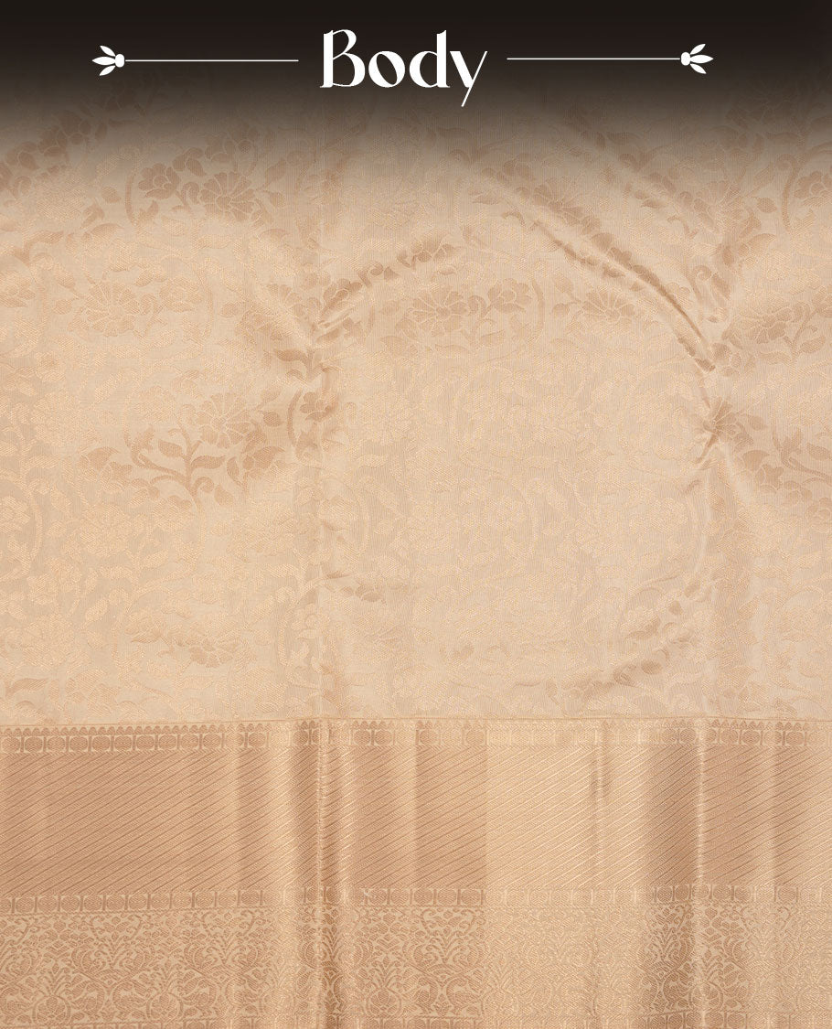Cream colour Kancheepuram silk saree featuring antique silver floral jacquard on the body with a zari border, paired with a matching blouse piece.