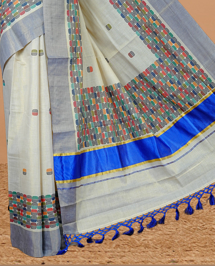 Cream colour Tissue kerala saree featuring Classy Multi colour Box pattern on body, Styled by blue & gold zari border and pallu, comes with matching blouse piece.