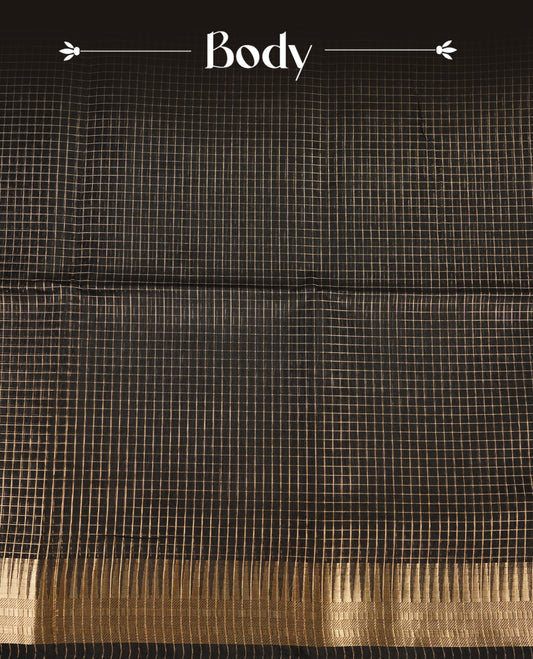 Black colour Maheshwari cotton saree, gold zari small checks on body, complement self colour gold zari temple design border comes with matching blouse.