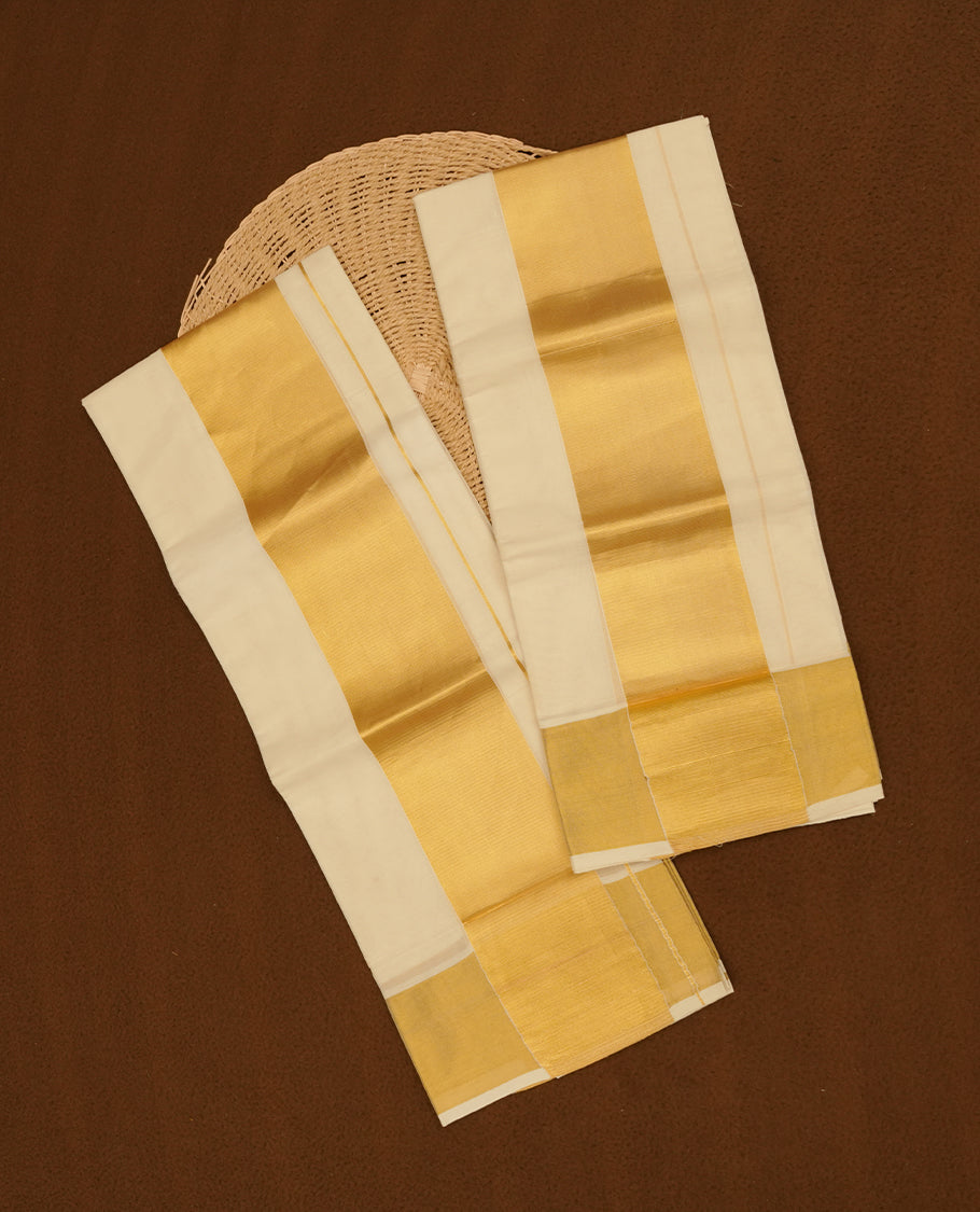 Off white colour cotton set mundu highlights traditional gold zari border (2.00/2.80 MTS).