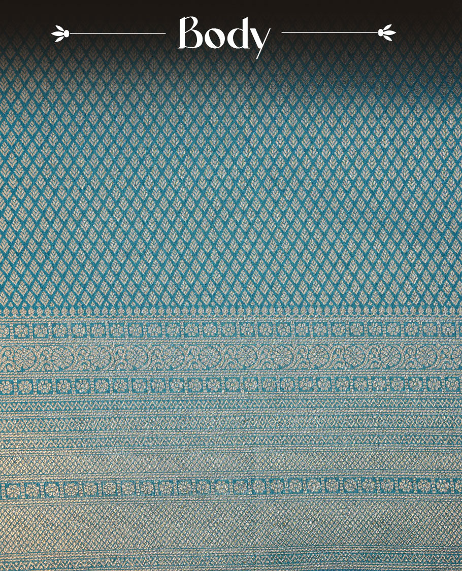 Teal blue colour semi soft silk brocade saree featuring delicate gold woven motifs across the body, enhanced with a self-colour intricately designed border and pallu, paired with a matching blouse piece.