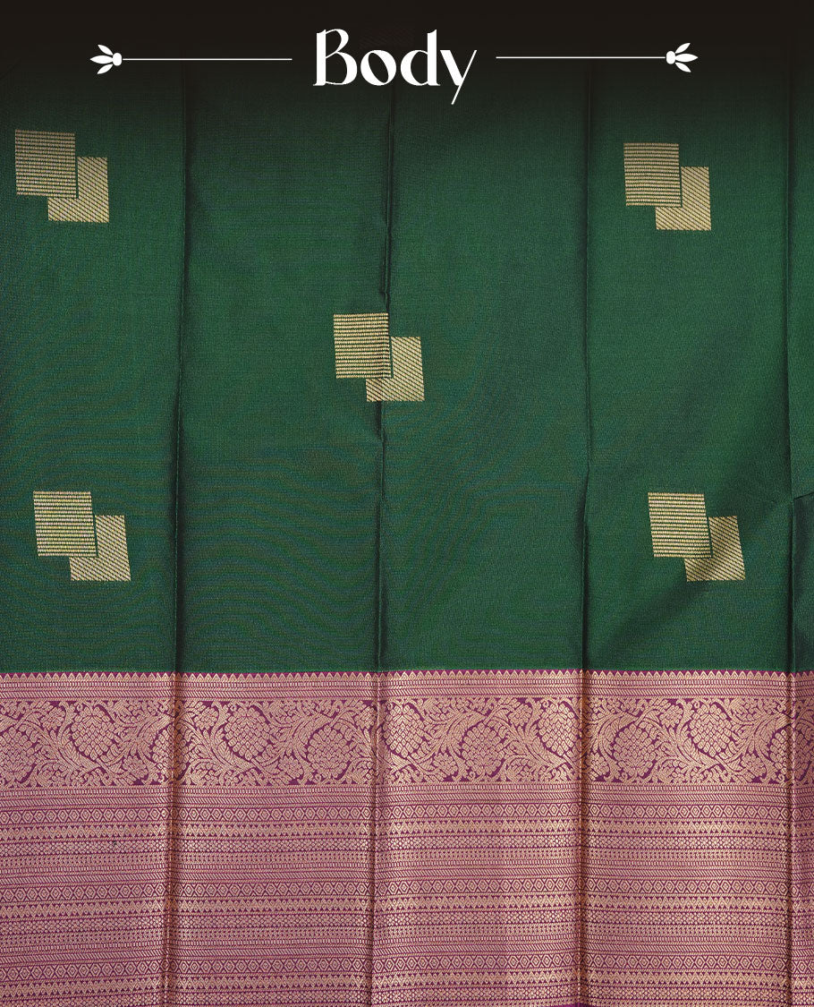 Green colour soft silk saree featuring Gold zari motifs on body, complemented by contrast purple colour with traditional border, paired with matching blouse piece.