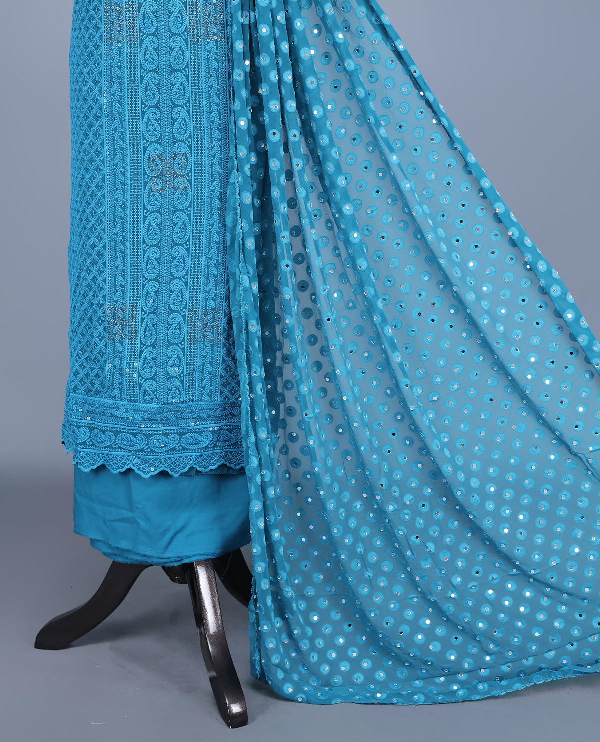 Teal Blue Colour Georgette Salwar Material featuring elegant Chikankari Work on the kurta, paired with a matching bottom & elegant sequined Dupatta.