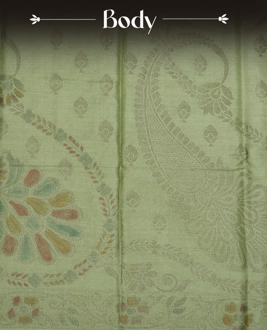 Pastel green colour pure tussar silk saree featuring elegant antique zari kodi patterns across the body, designed with a graceful borderless finish for a refined look. Paired with a matching blouse piece.