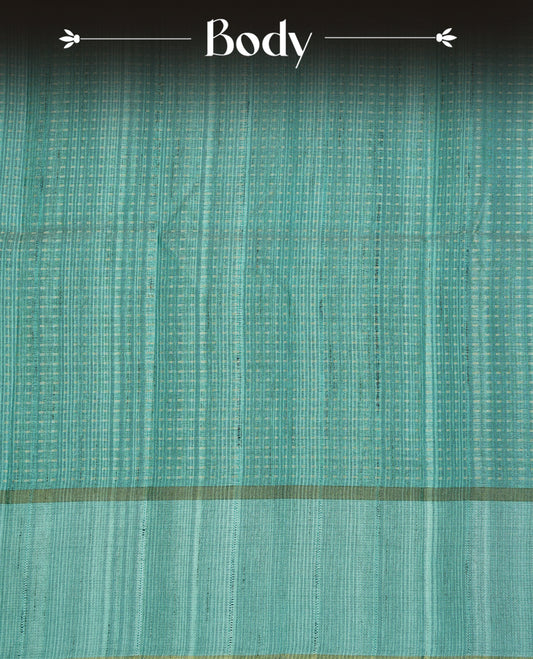 Aqua colour semi tussar silk saree featuring elegant gold zari dotted stripes across the body, enhanced with a rich zari woven border. Comes with a matching blouse piece.