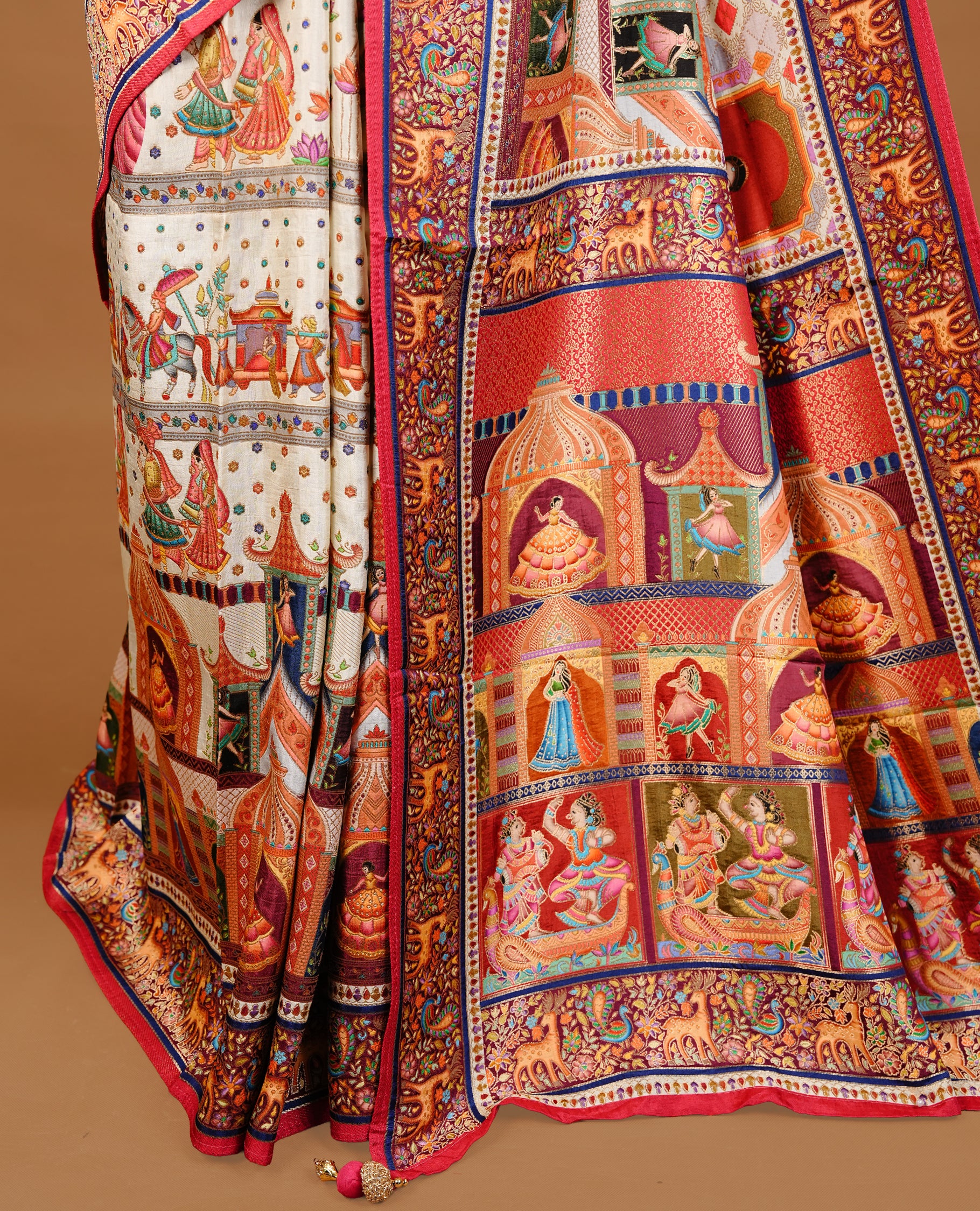 Off White colour Pashmina Saree featuring intricate heritage inspired woven palace motifs, enhanced with a contrast multicolour woven border and a richly detailed traditional pallu, paired with a matching blouse piece.