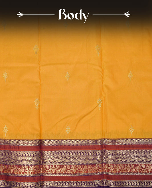 Mustard yellow colour semi wedding silk saree featuring gold zari buttas on body, contrast brown & purple colour traditional border on body, rich pallu comes with matching blouse piece