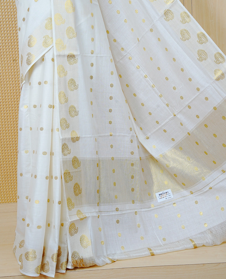 Cream Colour Cotton Kerala Saree Featuring Gold Zari Dot Motifs Across the Body, Enhanced with a Gold Zari Border and Traditional Gold Zari Pallu, Paired with Matching a Blouse Piece