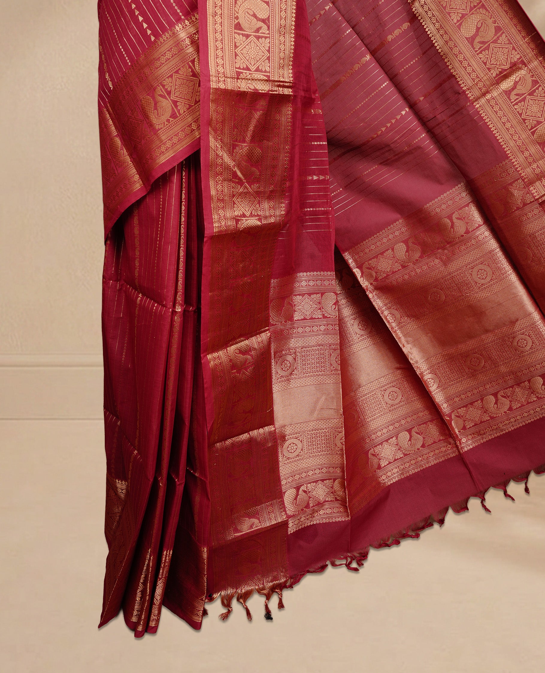 Red colour Chettinad cotton saree featuring Gold zari stripes on body, complemented by Self colour with Gold zari border, paired with matching blouse piece.